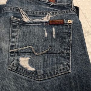2 pair of 7 of all man kind jeans . 1 bootcut ,